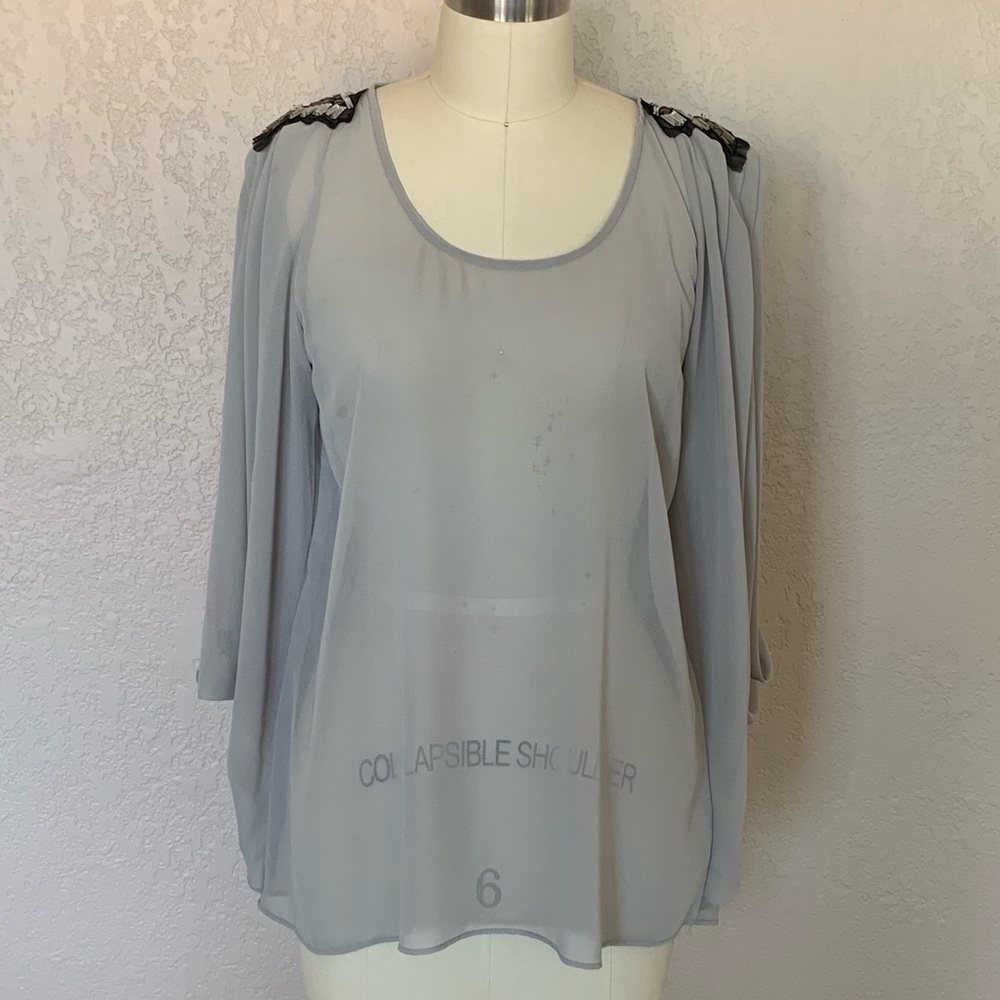 Sheer embellished tunic top